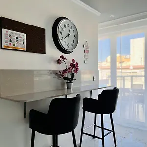 By Promenade And Apartment